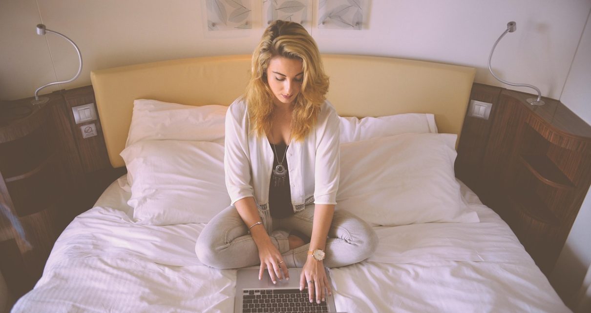 Woman, working, bed — How to Find the Best Night Part-Time Jobs Near You